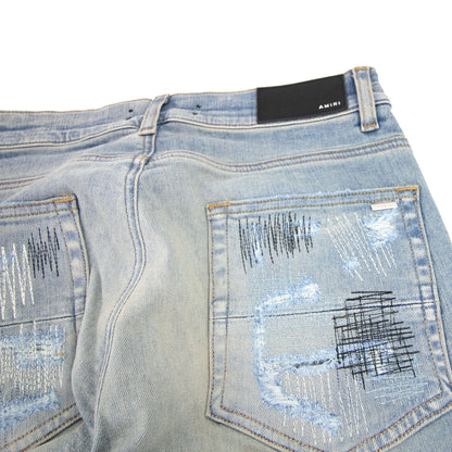 Amiri All Over Repair Jean Denim