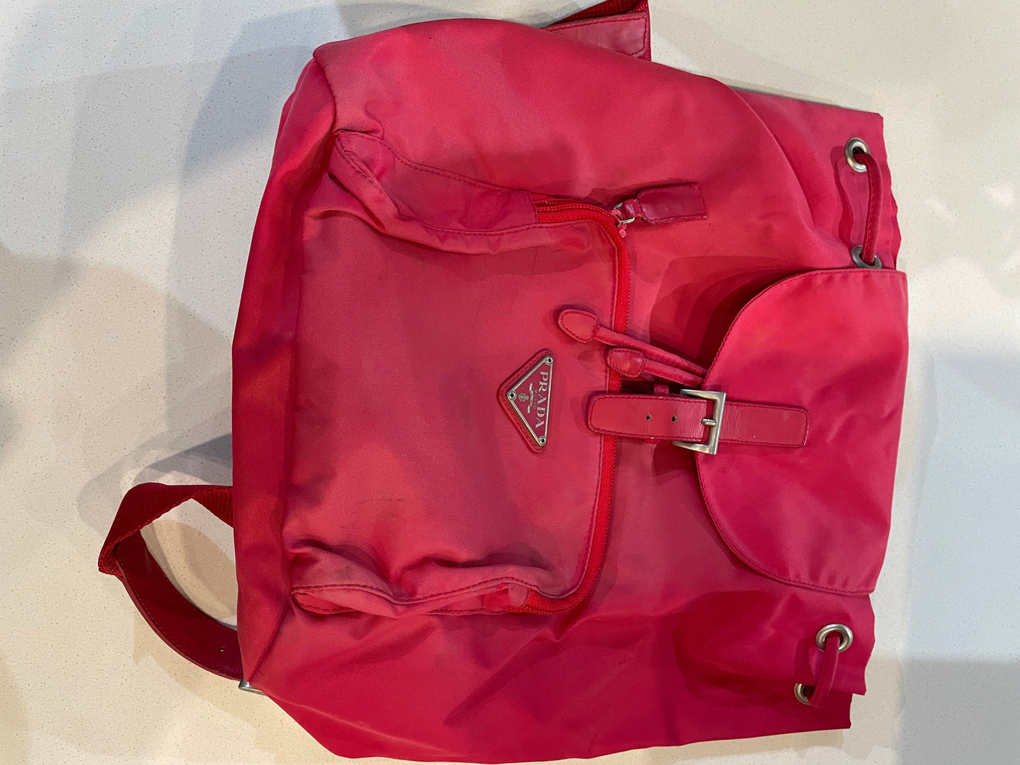 PRADA RED BACKPACK