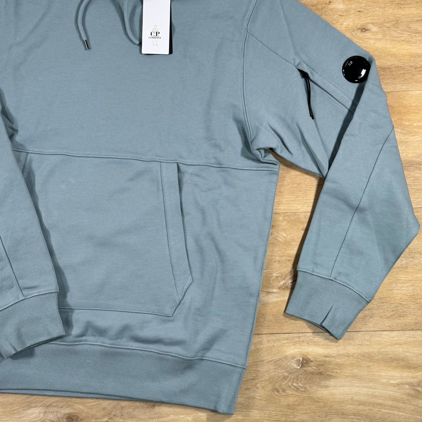 C.P. Company Diagonal Raised Fleece Lens Hoodie in Silver Blue