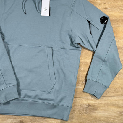 C.P. Company Diagonal Raised Fleece Lens Hoodie in Silver Blue